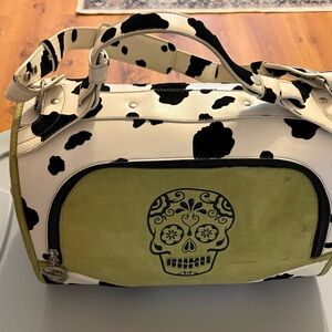 Stylish Black and White Dog Carrier with Green Accent